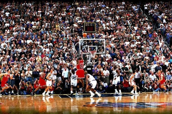 Michael Jordan takes the winning shot in Game 6 of the 1998 NBA Finals